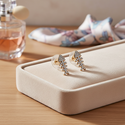 Brass Fishbone Stud Earrings – Gold Finish with Crystal Shine